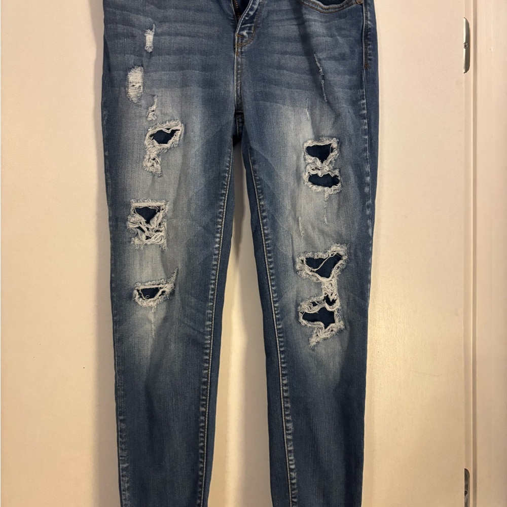 Distressed Blue Denim Jeans